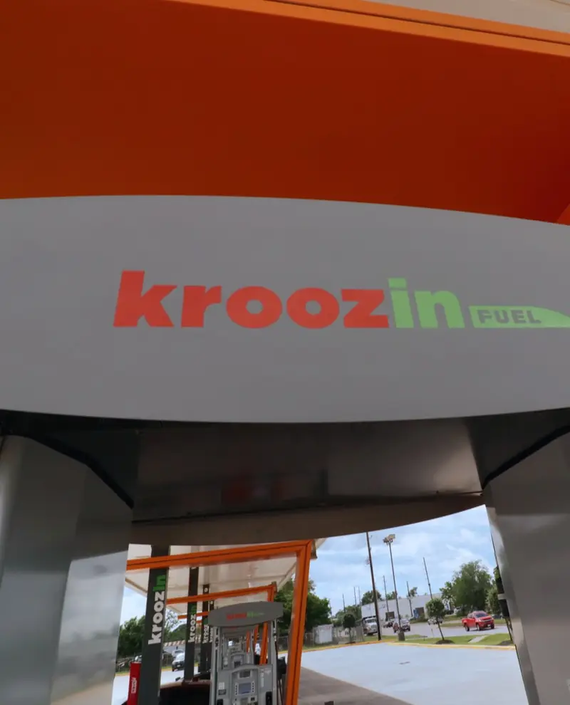 Kroozin Fuel sign on a canopy column, 16123 W Bellfort Ave