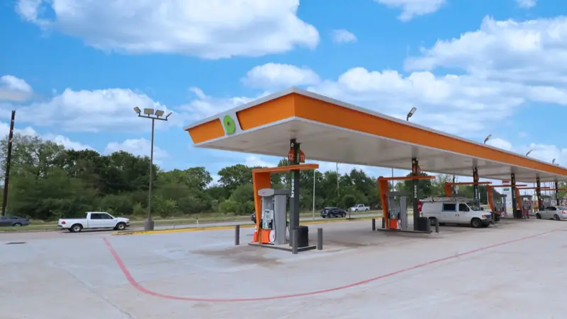 Kroozin Sugar Land fuel canopy with the green Q mark, 16123 W Bellfort Ave, Sugar Land